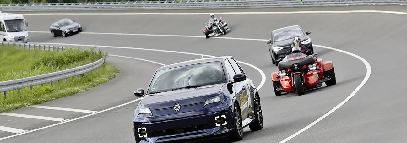 [Vehicles on a banked curve]