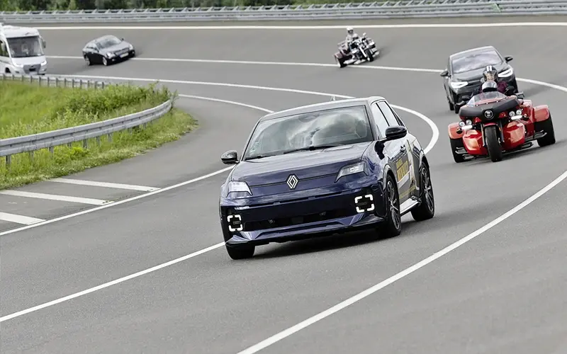 [Vehicles on a banked curve]