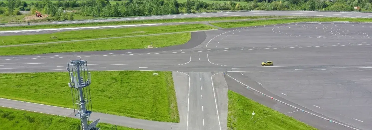 [Areal view of our vehicle dynamics area with cross approach]