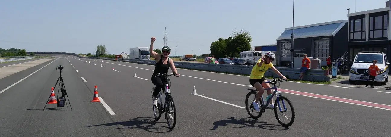 [Joy at the finish line on the oval track at the Aldenhoven Testing Center]