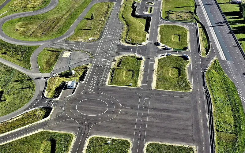 [Aerial view of the urban environment]